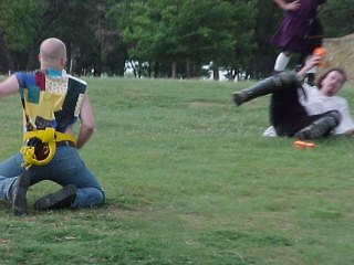 Trelath watches Drakell fall down.